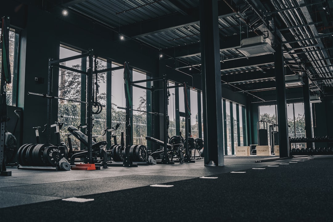 Main training floor with machines under low lighting